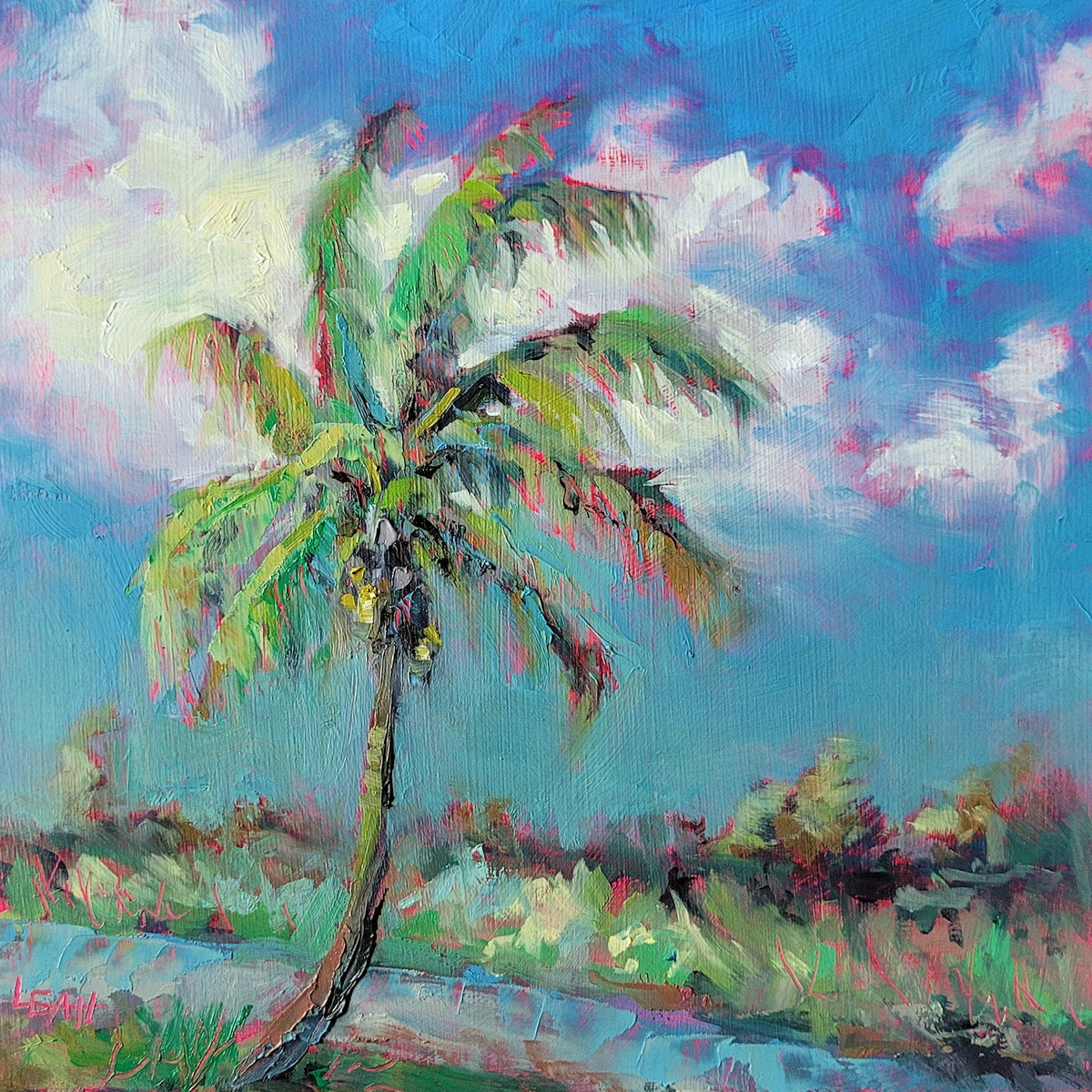A square canvas painting of a tropical palm tree under a vibrant blue sky with white clouds, displayed on a wooden surface.